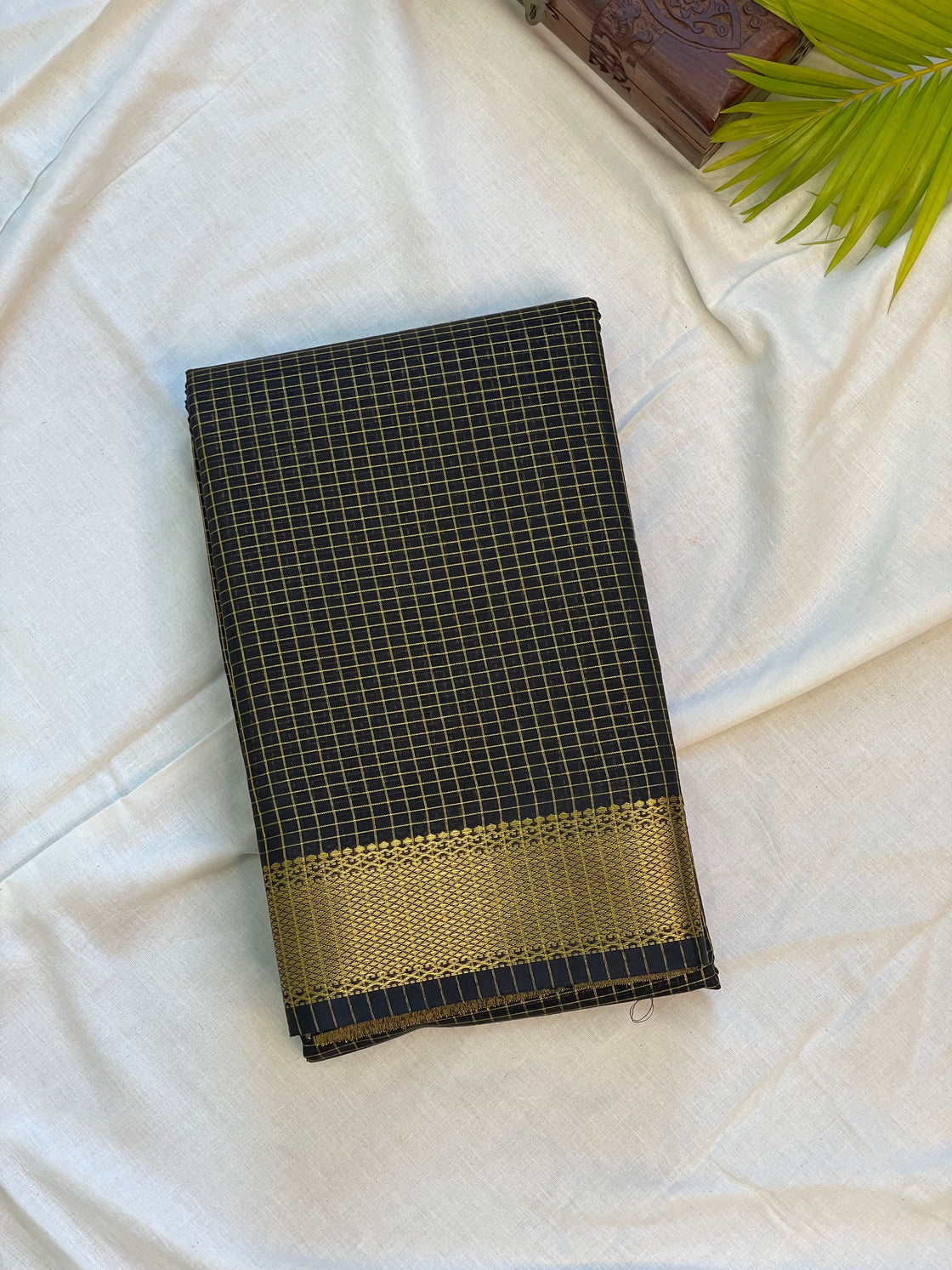 Eterna Noir Grid Saree – Black & Gold Zari Classic